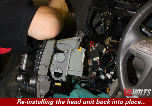 Camry Audio System Installation- Re-installing the head unit back into place.